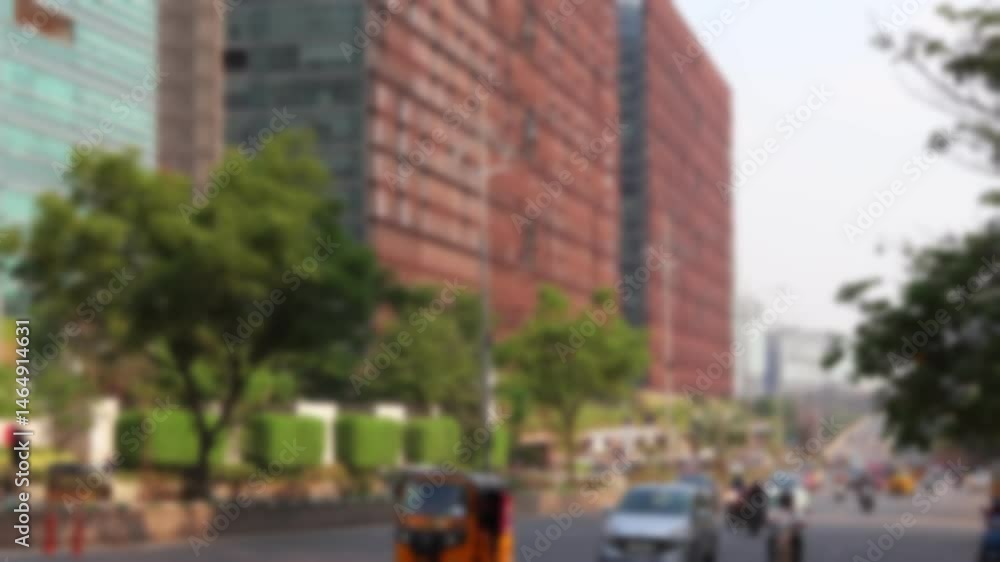 Blurred view of the Hitech City Main Road with vehicle traffic in Cyberabad, the downtown of Hyderabad, India. Real time motion video for background. Blurred view of the Hitech City Main Road with vehicle traffic in Cyberabad, the downtown of Hyderabad, India. Real time motion video for background.