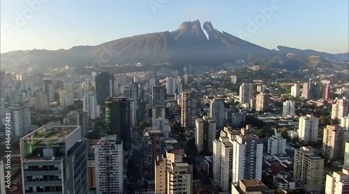 Aerial shot of Caracas with Avila Mountain and modern towers