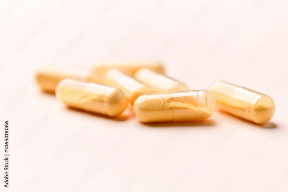 Coenzyme Q10 capsules. Antioxidants. Concept for a healthy dietary supplementation. Bright background. Soft focus. Close up. Copy space. Coenzyme Q10 capsules. Antioxidants. Concept for a healthy dietary supplementation. Bright background. Soft focus. Close up. Copy space.