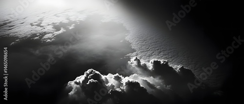 Captivating and atmospheric image of dark brooding clouds filling the monochrome sky creating a powerful and mysterious mood