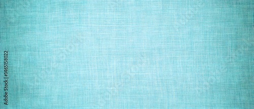 A visually appealing abstract background featuring a teal colored textured fabric or woven material with a vintage grunge like appearance
