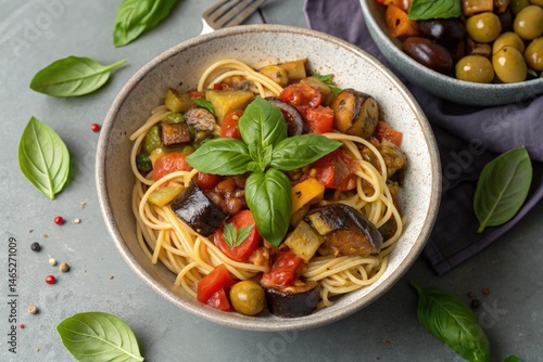 Obraz na płótnie Tasty Caponata Pasta With Fresh Basil Served in a Bowl Generative AI w salonie