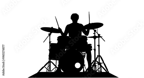 Drummer playing drums against white background