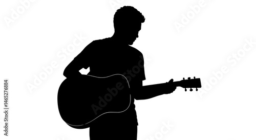 Silhouette of man playing acoustic guitar on light background