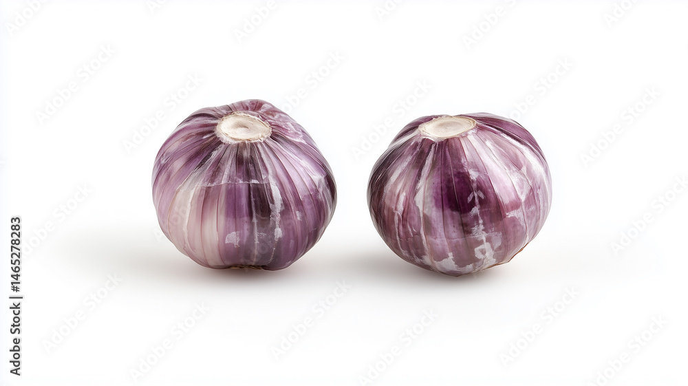 Obraz premium Two Fresh Garlic Cloves on a Clean White Background with Soft Studio Lighting for Product Photos