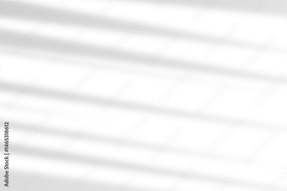 Fototapeta premium Shadow pattern from a windowpane overlaying a white background. Sunlight through a window casting shadows on a white surface.Window frame shadows projected on a clean white overlay.