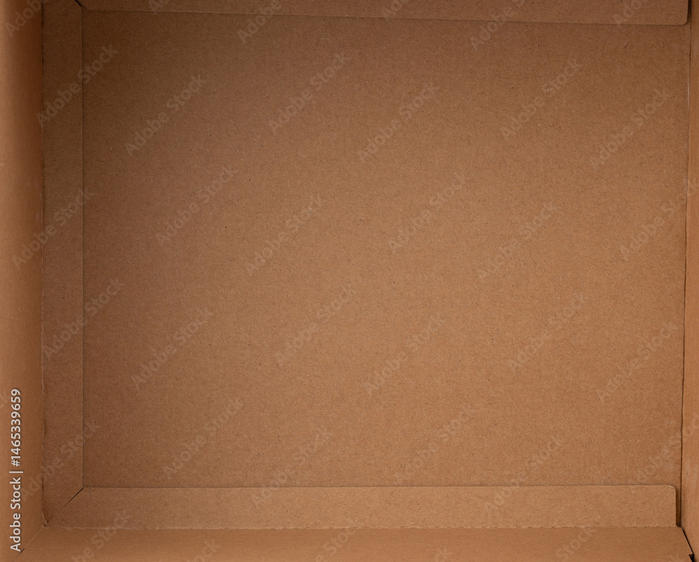 Brown cardboard box positioned on neutral background for packaging purposes