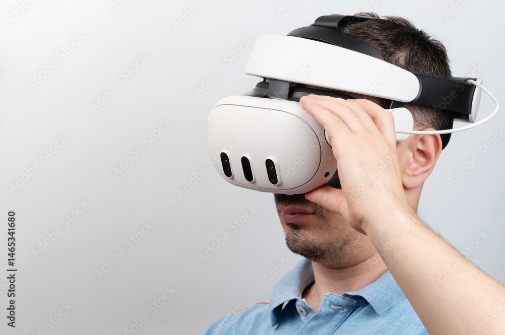 Virtual reality experience for man in modern setting during daytime indoors