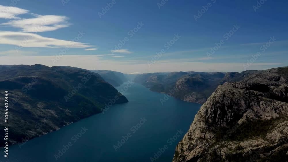 Majestic Fjord Landscape: Aerial View of Narrow Waterway Between Mountains Majestic Fjord Landscape: Aerial View of Narrow Waterway Between Mountains