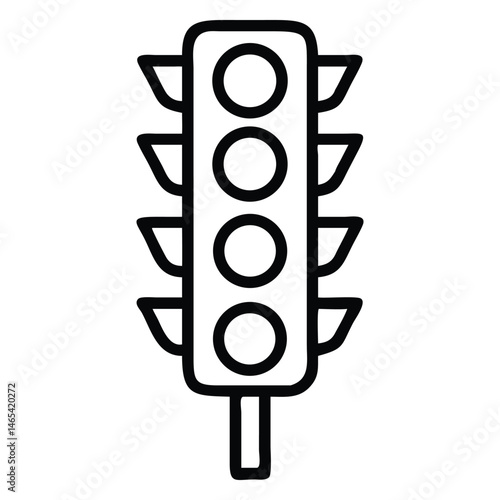 A traffic signal shows four round lights and side shields in outline