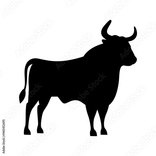 Black Silhouette of a Powerful Bull Standing Strong and Proud