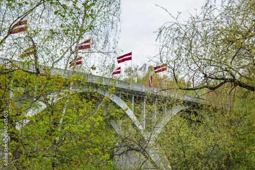 Gauja bridge in May with national flags in honour of 4th May celebration in Sigulda in Latvia