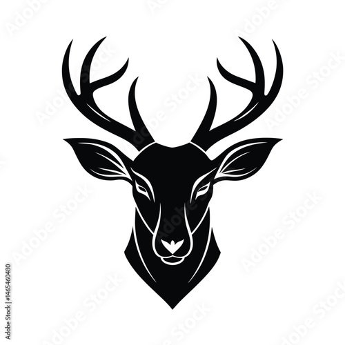 Elegant minimalist illustration of a deer head silhouetted in black with large antlers perfect for design.