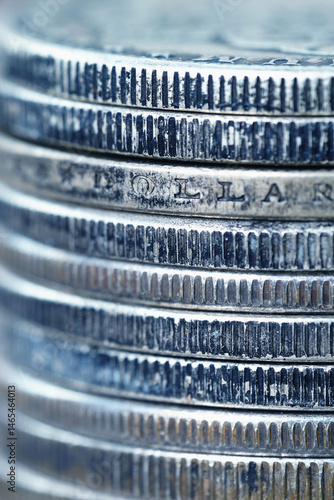 US dollar coin close up. Money, business and economy concept. Vertical image