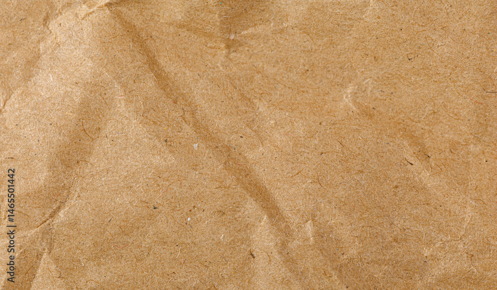 Brown texture kraft paper, recycled cardstock. Old crumpled recycled paper of old crumpled recycled paper