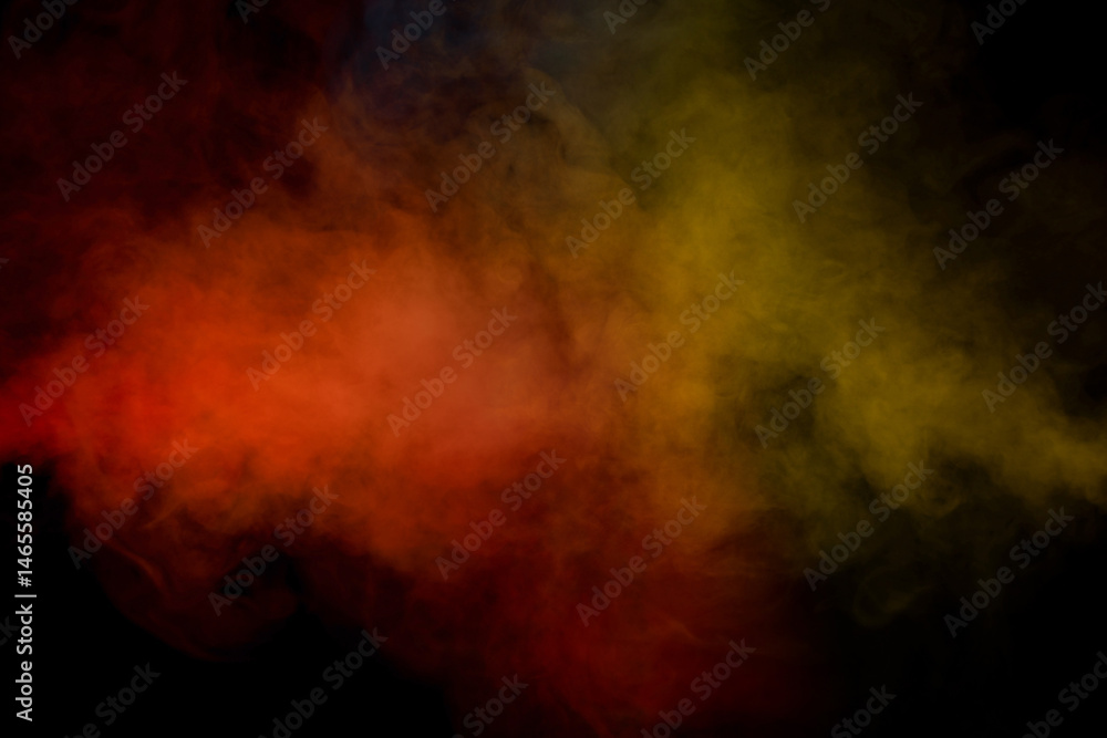 Fototapeta premium Orange and red steam on a black background.