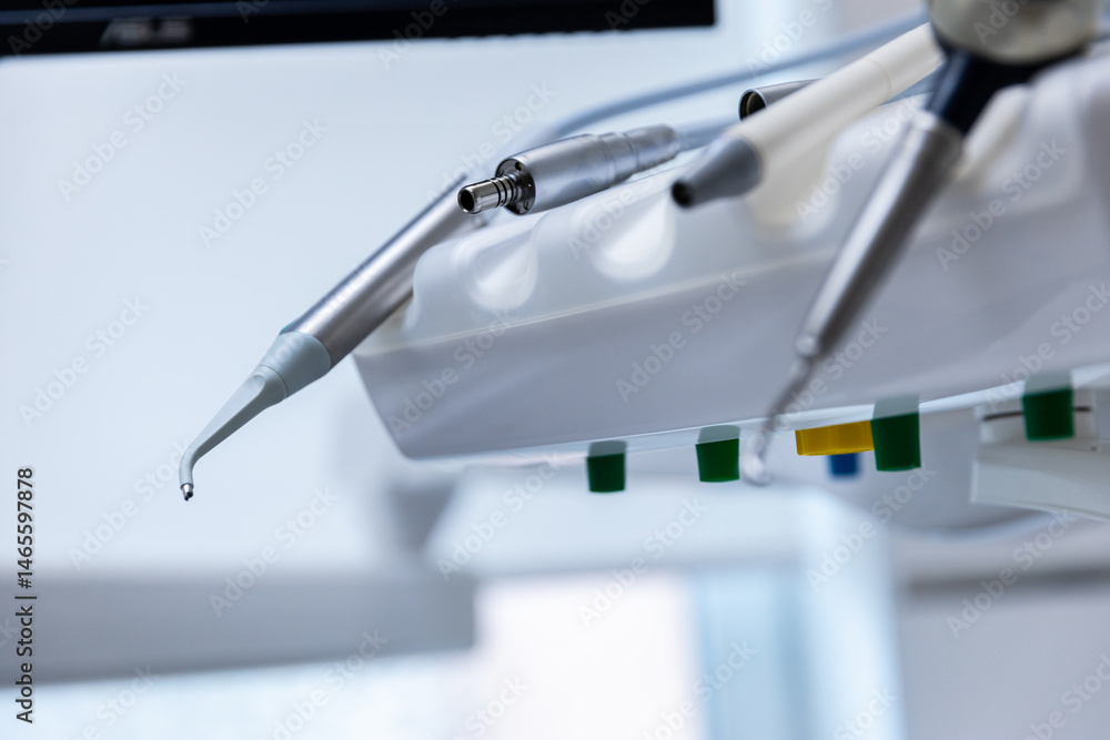 Close-up of Dental Instruments with Modern Design in a Bright Clinic Setting Showcasing High-Tech Tools for Oral Care and Treatment Procedures Close-up of Dental Instruments with Modern Design in a Bright Clinic Setting Showcasing High-Tech Tools for Oral Care and Treatment Procedures
