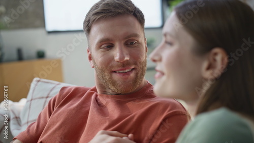 Obraz na płótnie Smiling soulmates talking home couch sharing dreams closeup. Relaxed family w salonie