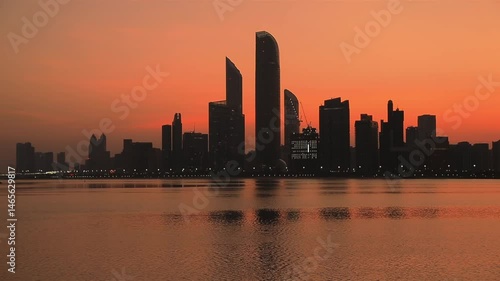 Wallpaper Mural Colorful dawn in Abu Dhabi, United Arab Emirates, cityscape silhouette Torontodigital.ca