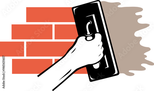 Spatula in hand spreads plaster on a brick wall