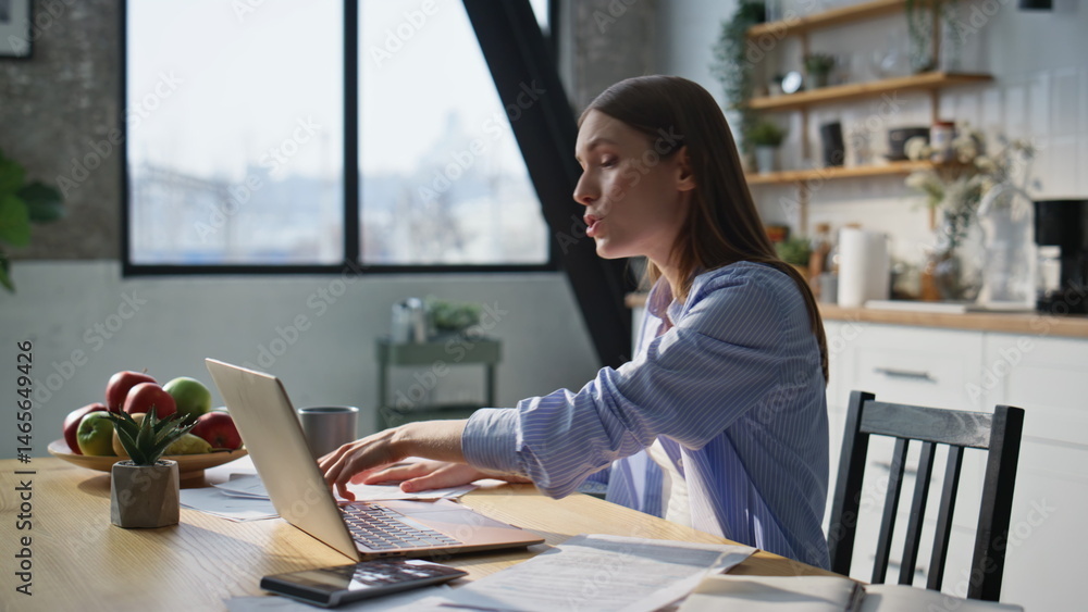 Woman boss arguing video meeting by laptop at home office closeup. Nervous lady