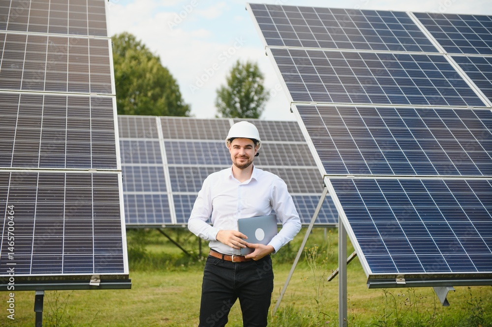 Fototapeta premium The solar farm, solar panel with engineer check the operation of the system, Alternative energy to conserve the worlds energy, Photovoltaic module idea for clean energy production.