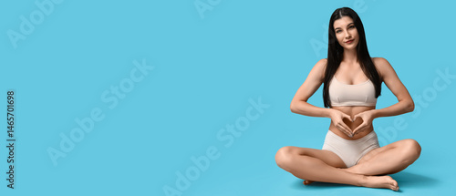 Beautiful young woman showi...