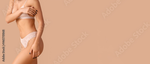 Young woman in underwear wi...