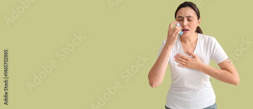 Sporty young woman using in...