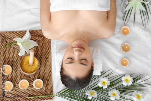 Young Asian woman relaxing ...