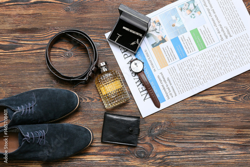 Newspaper with male shoes, ...