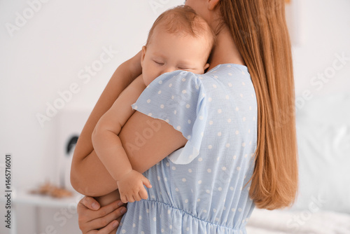 Young mother with her sleep...