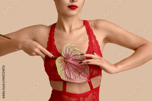 Young woman in sexy red und...