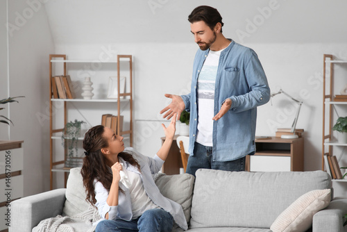 Unhappy couple quarreling a...