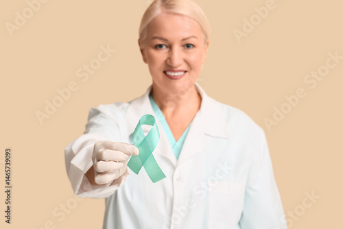 Mature female doctor with t...