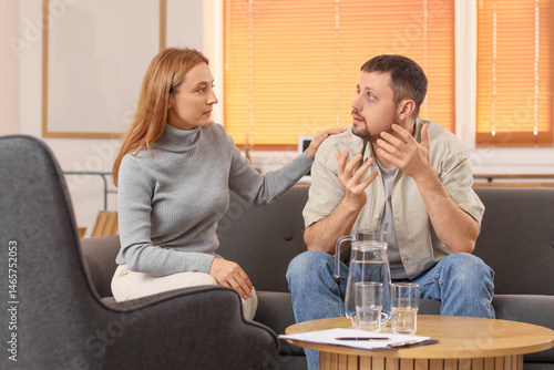 Male drug addict talking to...