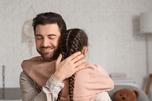 Happy man hugging adopted g...