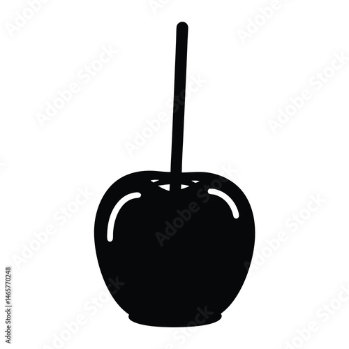 Silhouette of a delicious looking candy apple on a stick perfect treat