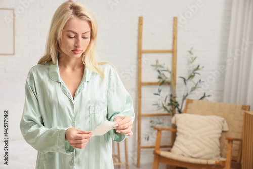 Young woman with menstrual ...