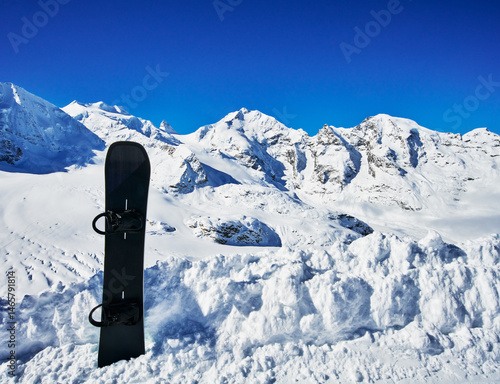 Snowboard in the snow at Diavolezza, Switzerland, Europe 