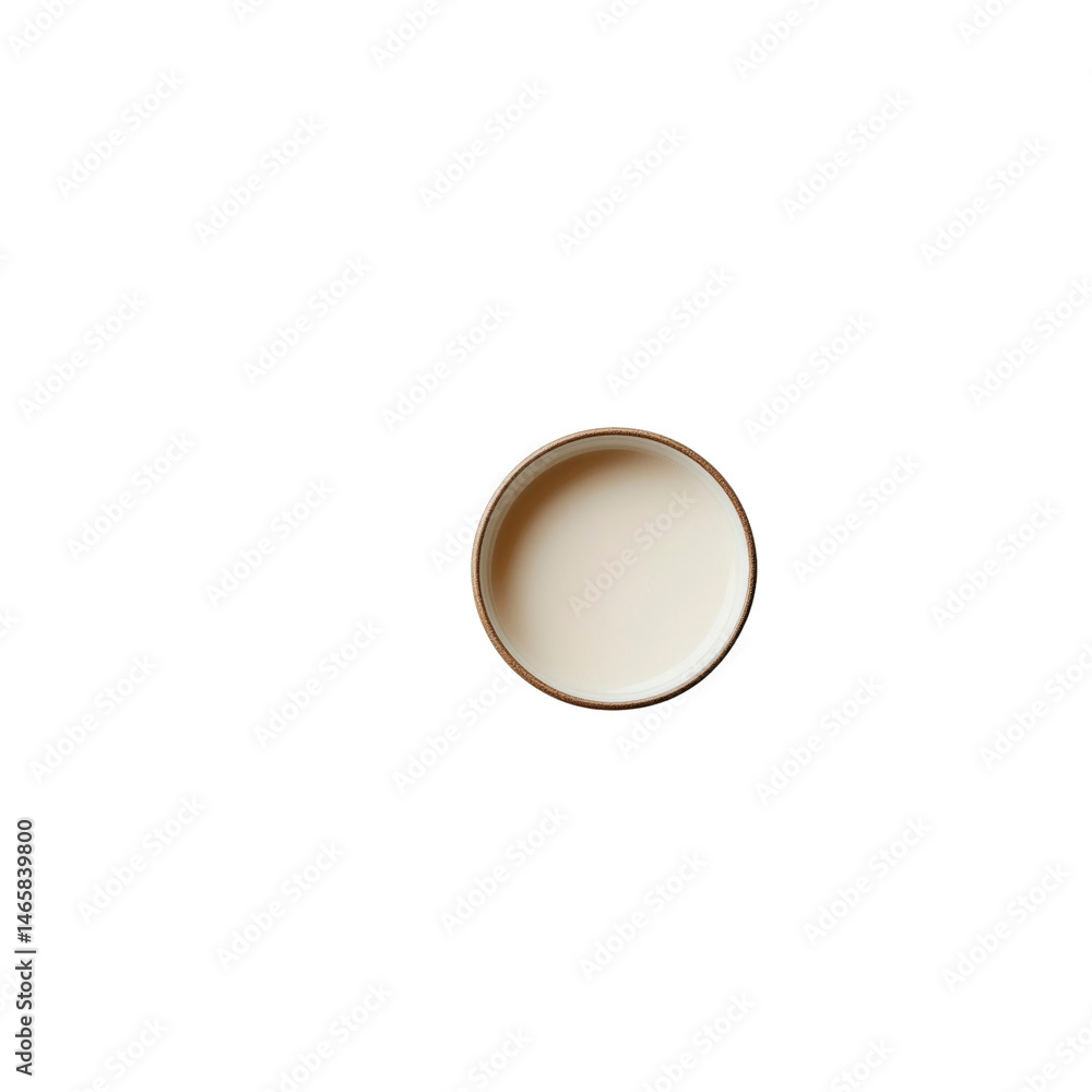 Overhead View of a Small Bowl of Creamy Oat Milk