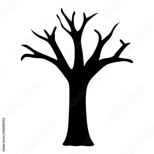 Silhouette of a bare tree with branches reaching into the sky