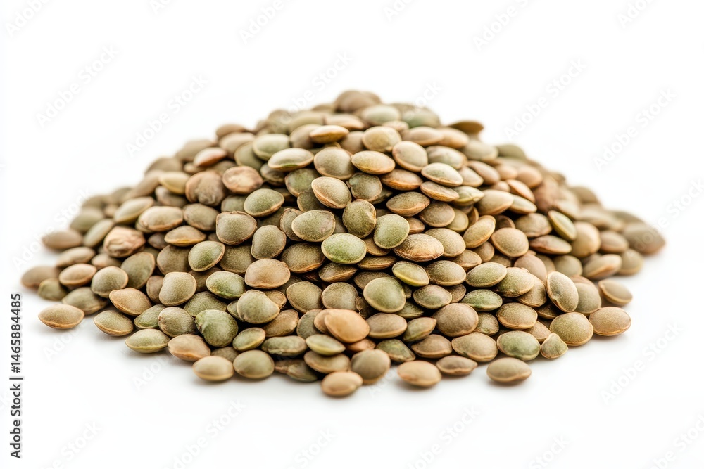 Fototapeta premium Pile of raw brown lentils on a white background ready for cooking