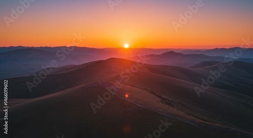 Wallpaper Mural Vibrant Sunset Over Rolling Hills and Distant Mountains Torontodigital.ca