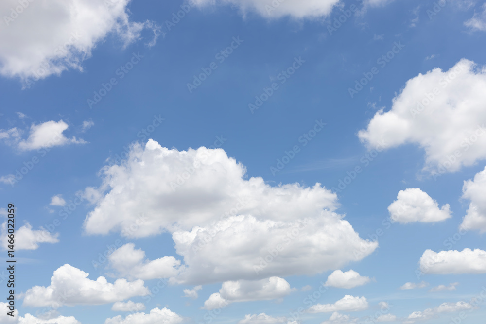 Fototapeta premium Blue sky with soft white clouds for abstract background. White fluffy clouds in the blue sky.