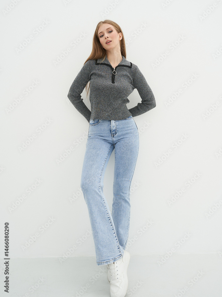 Elegant female model poses in studio showcasing modern fashion aesthetics and style Elegant female model poses in studio showcasing modern fashion aesthetics and style