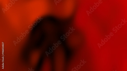 Red blood background featuring a smooth, abstract gradient with deep shadows and rich crimson tones for a bold and atmospheric design