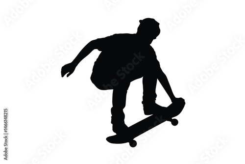 Silhouette of a Skateboarder Performing a Trick