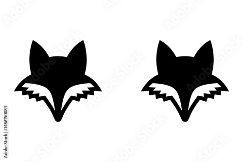 Two black fox head silhouette vector illustrations