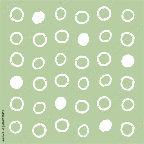 手描きの不揃いなドット柄とグリーン背景のデコレーション